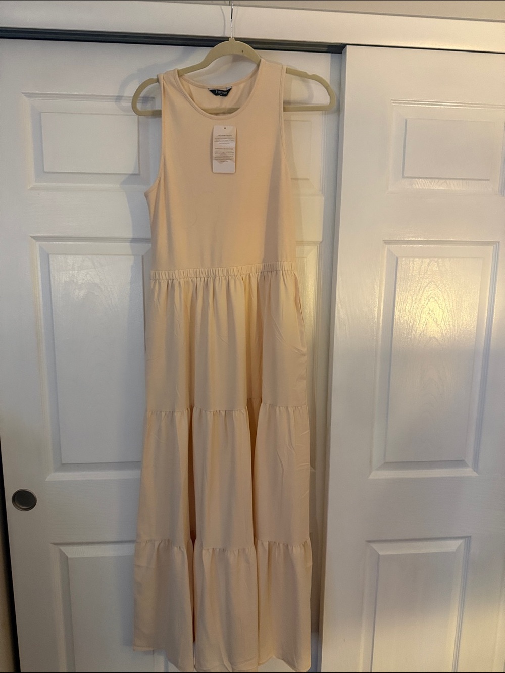 Fashion Nova Sleeveless Tiered Maxi Dress in Cream